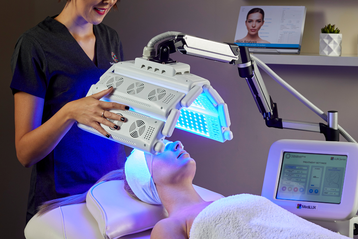 Powerful MediLUX LED device delivering medical-grade light therapy treatment in a clinical setting.