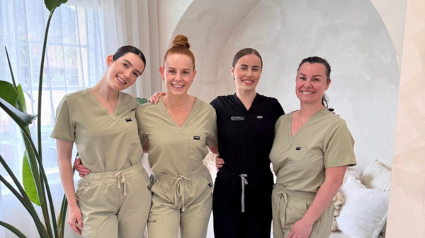 Happy clients in a clinical space, showing The Global Beauty Group’s mission to lead salon suppliers in making people feel wonderful.