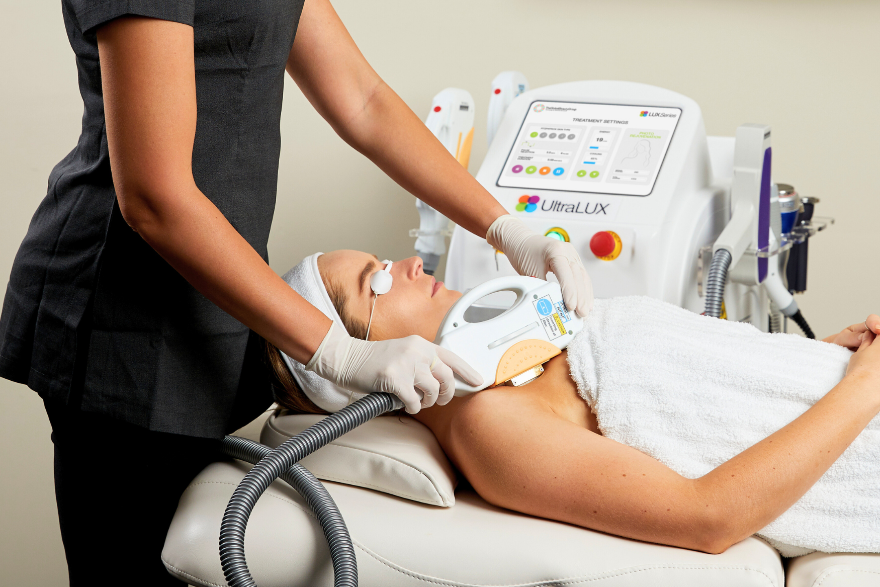 IPL photo rejuvenation treatment being performed on a client’s chest to target sun damage, pigmentation, and signs of ageing with a professional IPL machine